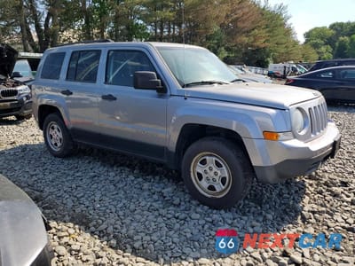 Czwarte zdjęcie samochodu z boku: 2014 JEEP PATRIOT SPORT VIN:1C4NJRBB6ED810366 - miniatura