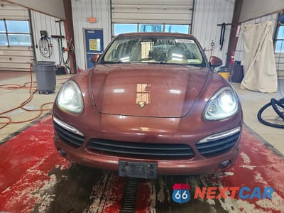 Piąte zdjęcie samochodu w środku: 2012 PORSCHE CAYENNE S HYBRID VIN:WP1AE2A26CLA92265 - miniatura