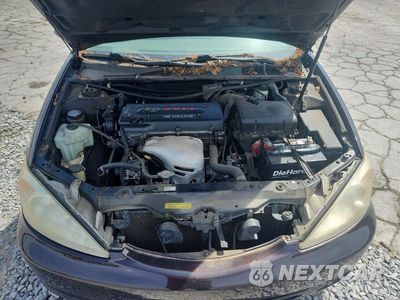 Zdjęcie 11 z 12 samochodu: 2004 TOYOTA CAMRY LE VIN:4T1BE32K34U937655 - miniatura