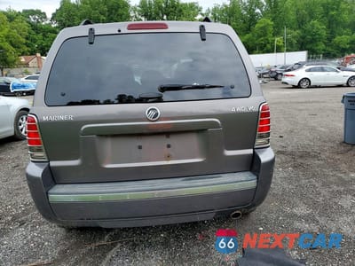 Zdjęcie 6 z 12 samochodu: 2006 MERCURY MARINER VIN:4M2YU57196KJ11365 - miniatura