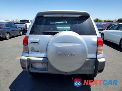 Zdjęcie 6 z 14 samochodu: 2001 TOYOTA RAV4 BASE VIN:JTEGH20V710041477 - miniatura