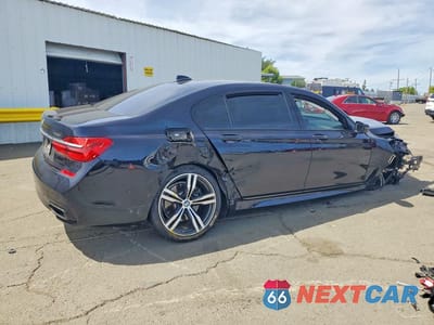 Trzecie zdjęcie samochodu z tyłu: 2017 BMW 740 I VIN:WBA7E2C34HG740829 - miniatura
