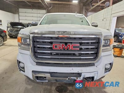 Piąte zdjęcie samochodu w środku: 2016 GMC SIERRA K2500 SLT VIN:1GT12TE82GF162900 - miniatura
