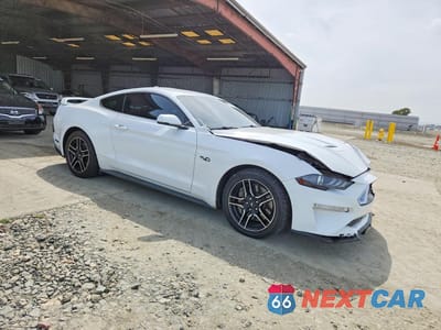 Czwarte zdjęcie samochodu z boku: 2022 FORD MUSTANG GT VIN:1FA6P8CF8N5129656 - miniatura