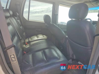 Zdjęcie 10 z 13 samochodu: 2003 FORD EXPLORER SPORT TRAC VIN:1FMDU67E93UC58648 - miniatura