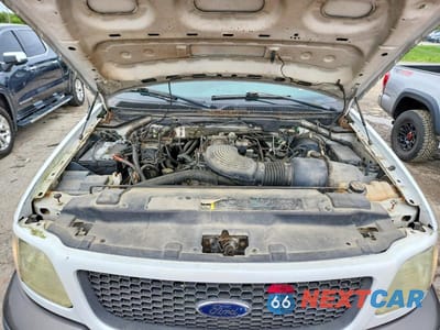 Zdjęcie 11 z 12 samochodu: 2002 FORD F150 SUPERCREW VIN:1FTRW08682KB34597 - miniatura