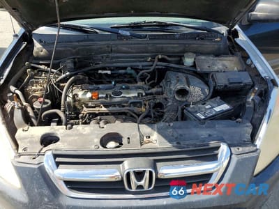 Zdjęcie 12 z 13 samochodu: 2004 HONDA CR-V EX VIN:SHSRD78874U205085 - miniatura