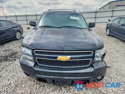 Piąte zdjęcie samochodu w środku: 2014 CHEVROLET SUBURBAN C1500 LT VIN:1GNSCJE07ER199489 - miniatura
