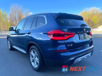 Trzecie zdjęcie samochodu z tyłu: 2021 BMW X3 XDRIVE30E VIN:5UXTS1C08M9F18949 - miniatura