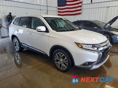 Czwarte zdjęcie samochodu z boku: 2016 MITSUBISHI OUTLANDER SE VIN:JA4AZ3A34GZ003276 - miniatura