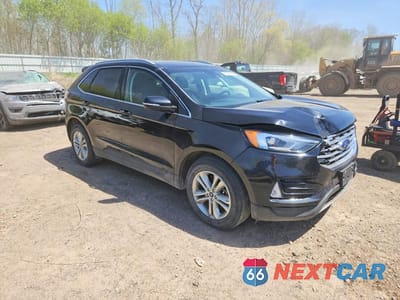 Czwarte zdjęcie samochodu z boku: 2019 FORD EDGE SEL VIN:2FMPK4J98KBB76935 - miniatura