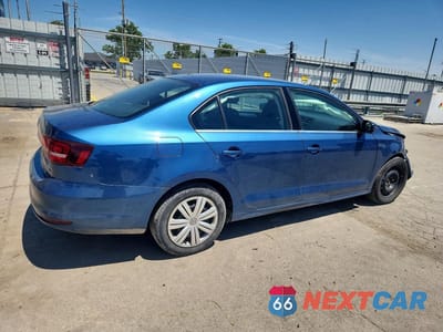 Trzecie zdjęcie samochodu z tyłu: 2017 VOLKSWAGEN JETTA S VIN:3VW2B7AJ4HM414116 - miniatura