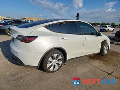 Trzecie zdjęcie samochodu z tyłu: 2023 TESLA MODEL Y VIN:7SAYGDEE7PA079088 - miniatura