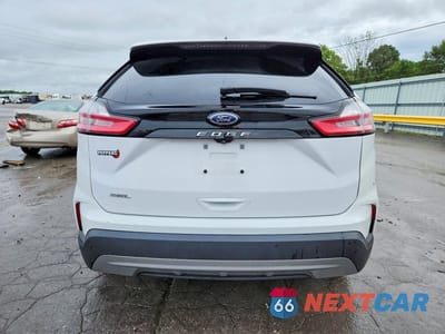 Zdjęcie 6 z 13 samochodu: 2021 FORD EDGE SEL VIN:2FMPK3J95MBA05881 - miniatura