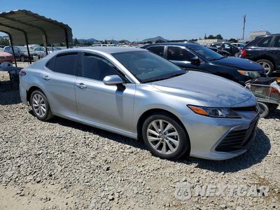 Czwarte zdjęcie samochodu z boku: 2024 TOYOTA CAMRY LE VIN:4T1C11AK3RU862713 - miniatura