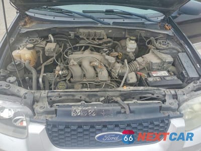 Zdjęcie 11 z 12 samochodu: 2007 FORD ESCAPE XLT VIN:1FMYU93157KB26008 - miniatura