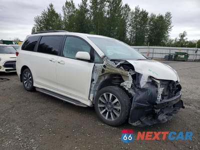 Czwarte zdjęcie samochodu z boku: 2019 TOYOTA SIENNA XLE 7-PASSENGER VIN:5TDDZ3DC3KS216793 - miniatura