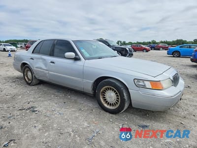 Czwarte zdjęcie samochodu z boku: 2002 MERCURY GRAND MARQUIS LS VIN:2MEFM75W82X615337 - miniatura