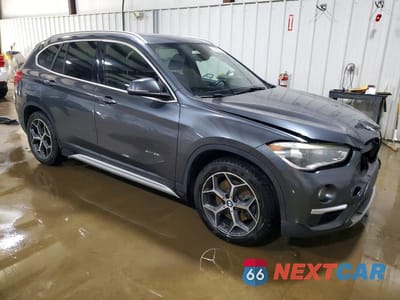 Czwarte zdjęcie samochodu z boku: 2017 BMW X1 XDRIVE28I VIN:WBXHT3C33H5F67907 - miniatura