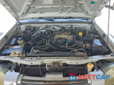 Zdjęcie 11 z 12 samochodu: 2001 NISSAN FRONTIER XE VIN:1N6ED27Y61C382887 - miniatura