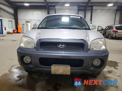 Piąte zdjęcie samochodu w środku: 2004 HYUNDAI SANTA FE GLS VIN:KM8SC73EX4U595062 - miniatura