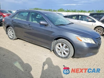 Czwarte zdjęcie samochodu z boku: 2007 TOYOTA CAMRY LE V6 VIN:4T1BK46K07U039382 - miniatura