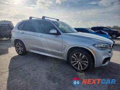 Czwarte zdjęcie samochodu z boku: 2018 BMW X5 XDR40E VIN:5UXKT0C59J0W02600 - miniatura