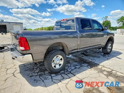 Trzecie zdjęcie samochodu z tyłu: 2014 RAM 2500 SLT VIN:3C6TR5DT4EG243468 - miniatura