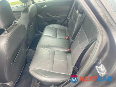 Zdjęcie 6 z 10 samochodu: 2015 FORD FOCUS TITANIUM VIN:1FADP3J23FL312020 - miniatura