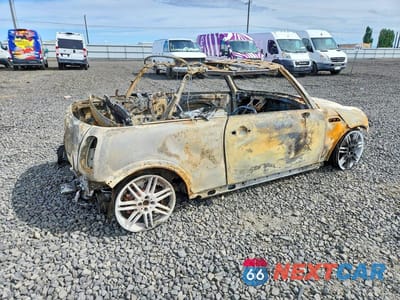Trzecie zdjęcie samochodu z tyłu: 2005 MINI COOPER S VIN:WMWRH33455TF83252 - miniatura