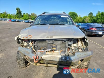 Piąte zdjęcie samochodu w środku: 2004 JEEP GRAND CHEROKEE LAREDO VIN:1J4GW48S64C133922 - miniatura
