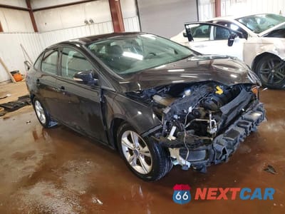 Czwarte zdjęcie samochodu z boku: 2014 FORD FOCUS SE VIN:1FADP3F20EL108055 - miniatura