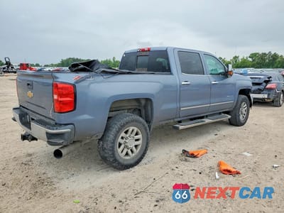 Trzecie zdjęcie samochodu z tyłu: 2016 CHEVROLET SILVERADO 2500 LTZ 4WD 6.6L TDSL VIN:1GC1KWE82GF115920 - miniatura