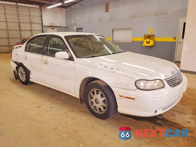 Czwarte zdjęcie samochodu z boku: 1999 CHEVROLET MALIBU LS VIN:1G1NE52MXXY144504 - miniatura