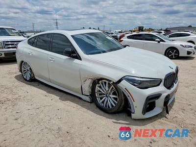 Czwarte zdjęcie samochodu z boku: 2022 BMW X6 XDRIVE40I VIN:5UXCY6C08N9K78067 - miniatura