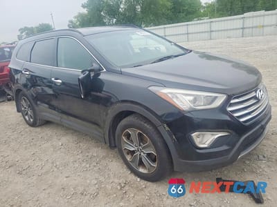 Czwarte zdjęcie samochodu z boku: 2016 HYUNDAI SANTA FE SE VIN:KM8SM4HF7GU155236 - miniatura
