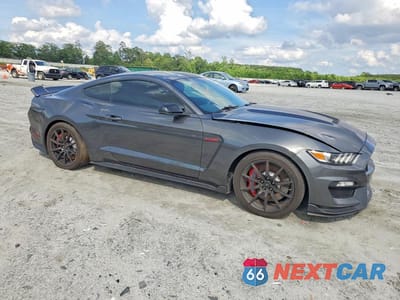 Czwarte zdjęcie samochodu z boku: 2016 FORD MUSTANG SHELBY GT350 VIN:1FA6P8JZXG5525930 - miniatura