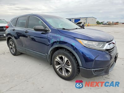 Czwarte zdjęcie samochodu z boku: 2017 HONDA CR-V LX VIN:7FARW5H37HE000452 - miniatura