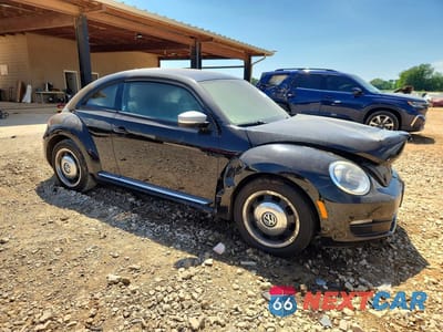Czwarte zdjęcie samochodu z boku: 2012 VOLKSWAGEN BEETLE VIN:3VWJP7AT2CM629646 - miniatura