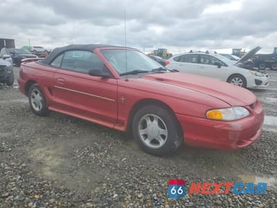 Czwarte zdjęcie samochodu z boku: 1996 FORD MUSTANG VIN:1FALP4449TF119220 - miniatura
