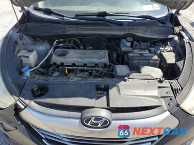 Zdjęcie 12 z 13 samochodu: 2013 HYUNDAI TUCSON GLS VIN:KM8JUCAC6DU568539 - miniatura
