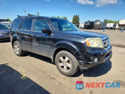 Czwarte zdjęcie samochodu z boku: 2009 HONDA PILOT EXL VIN:5FNYF38519B020906 - miniatura