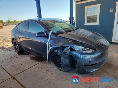 Czwarte zdjęcie samochodu z boku: 2022 TESLA MODEL Y VIN:7SAYGDEE4NF411469 - miniatura