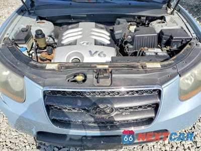 Zdjęcie 12 z 13 samochodu: 2007 HYUNDAI SANTA FE SE VIN:5NMSH73E37H038561 - miniatura