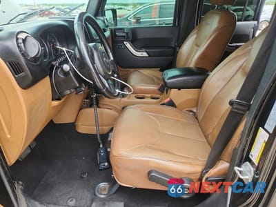 Zdjęcie 7 z 12 samochodu: 2017 JEEP WRANGLER UNLIMITED SAHARA VIN:1C4BJWEG3HL696314 - miniatura