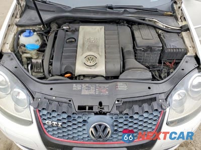 Zdjęcie 11 z 12 samochodu: 2006 VOLKSWAGEN NEW GTI VIN:WVWEV71K86W069959 - miniatura