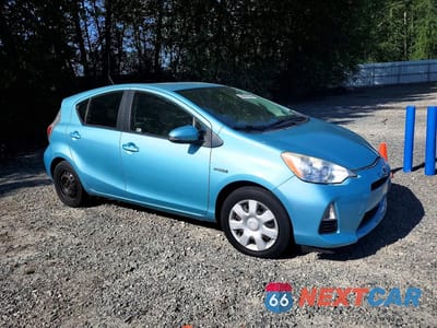 Czwarte zdjęcie samochodu z boku: 2013 TOYOTA PRIUS C TWO VIN:JTDKDTB32D1036102 - miniatura