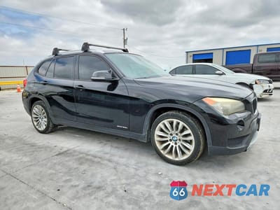 Czwarte zdjęcie samochodu z boku: 2013 BMW X1 SDRIVE28I VIN:WBAVM1C57DVW44804 - miniatura