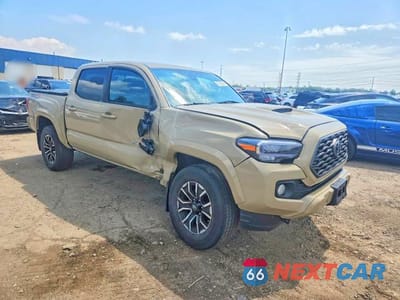 Czwarte zdjęcie samochodu z boku: 2020 TOYOTA TACOMA TRD SPORT VIN:3TMCZ5AN5LM288948 - miniatura