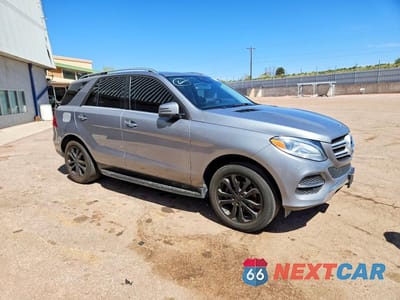 Czwarte zdjęcie samochodu z boku: 2016 MERCEDES-BENZ GLE 350 4MATIC VIN:4JGDA5HB6GA638478 - miniatura